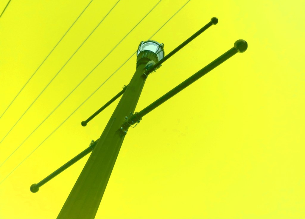Lamppost, photo by Michael Shoemaker
street light and bright yellow background