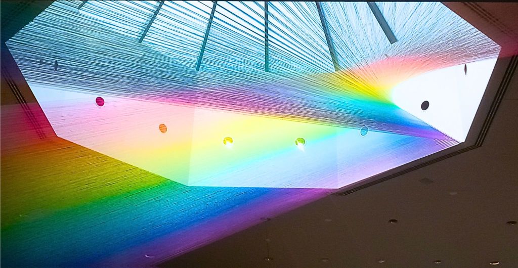 Winged Rainbow, photo by Michael Shoemaker 
rainbow colos in a window ceiling 